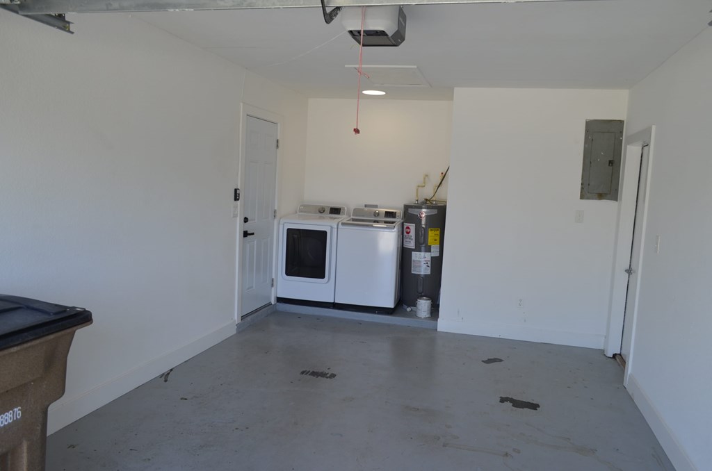a kitchen being remodeled with a stove and microwave in it