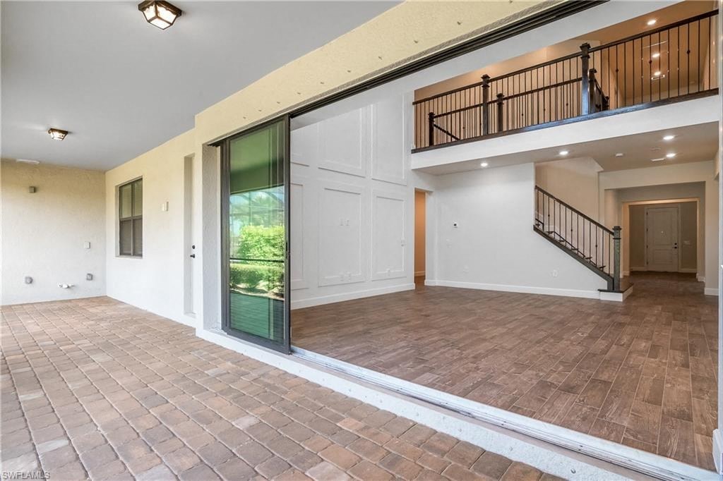 the family room has a large sliding glass door to the patio