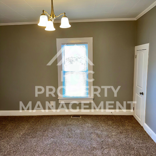 a window in a room with a closet and a door