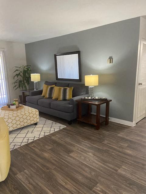 a living room with a couch and a table