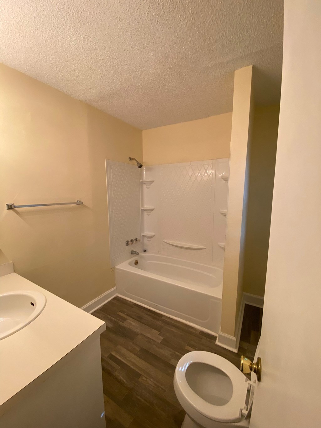 a small bathroom with a toilet and a shower