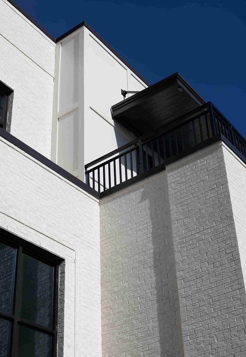 a balcony on the side of a building