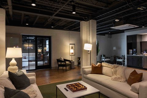 a living room with couches and a coffee table