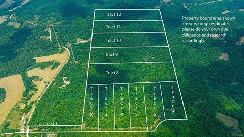 An aerial view of a forested area with property boundaries marked as Tract 1 to Tract 12.