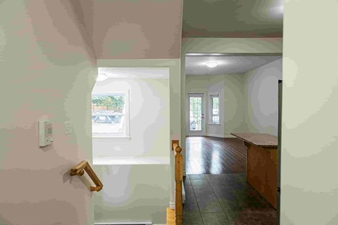 the view of the kitchen from the living room