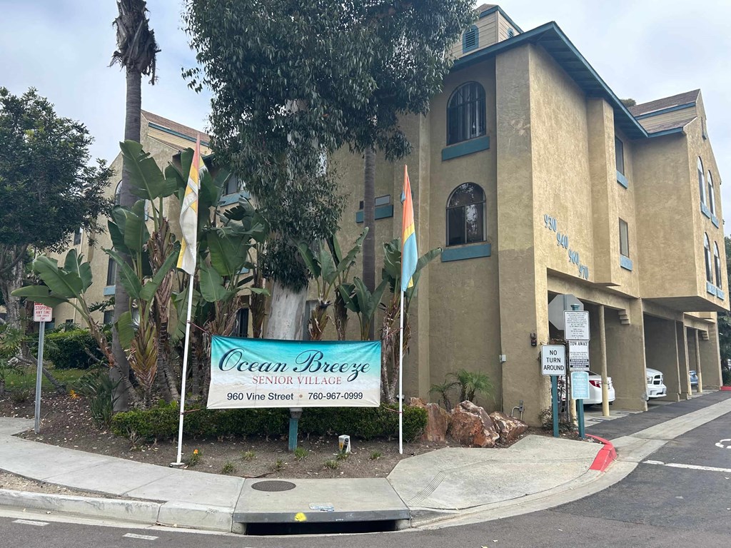 a large building with a sign in front of it
