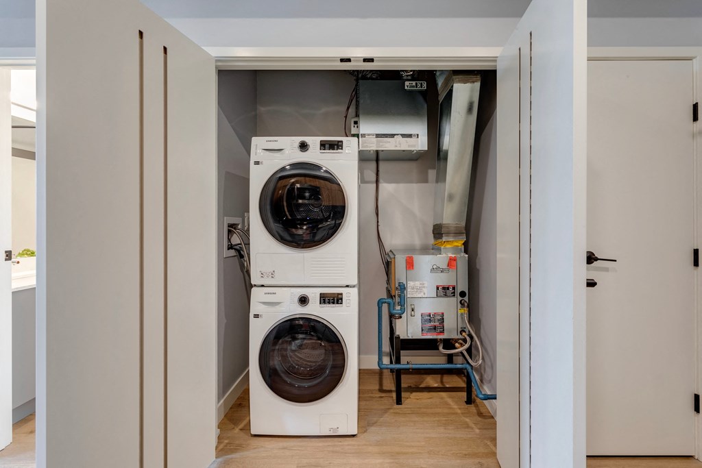 a washing machine and a dryer in a closet