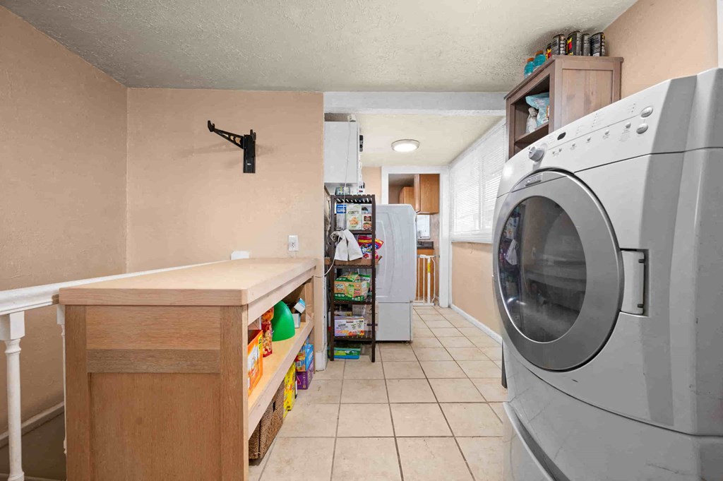 a laundry room with a washer and a dryer
