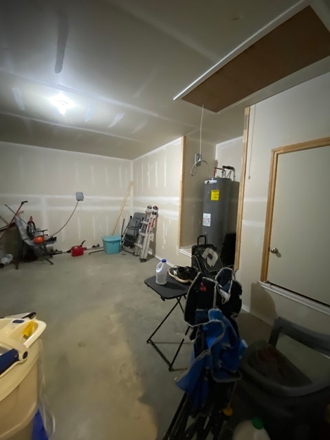 A room with a lot of tools and equipment scattered around.