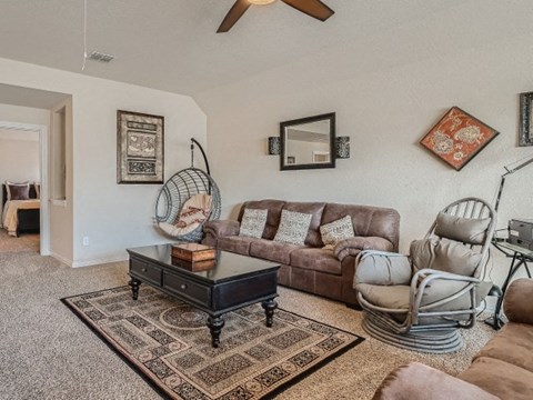 a living room with a couch and a table