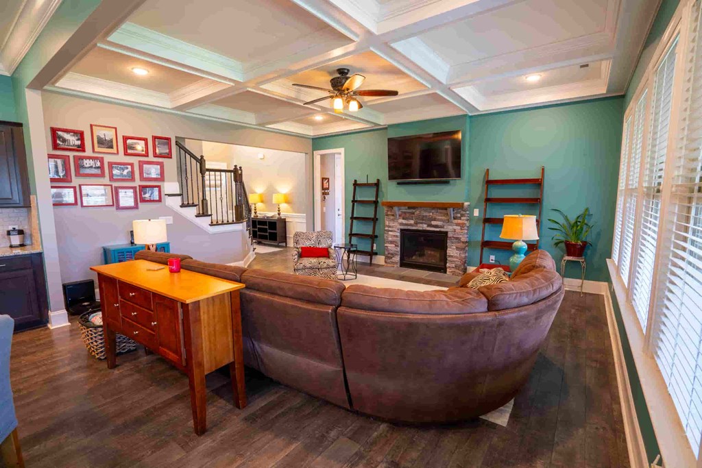 a living room with a couch and a tv