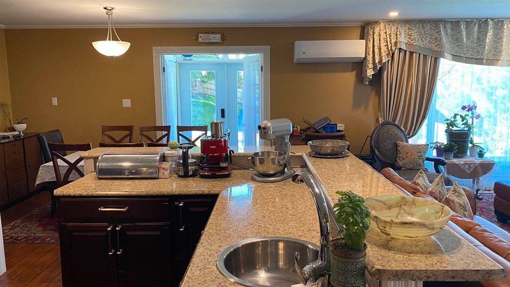 a kitchen with a sink and a counter top