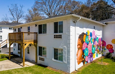 a house with a mural on the side of it