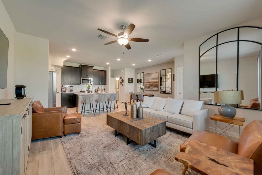 a living room with a couch and a table