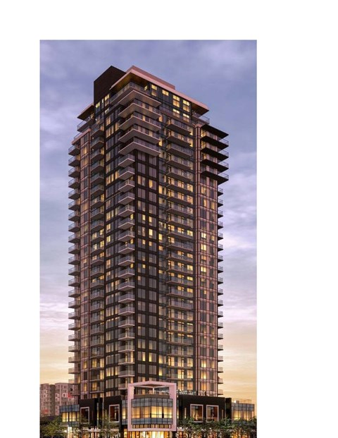 A tall building with a lot of windows is shown.