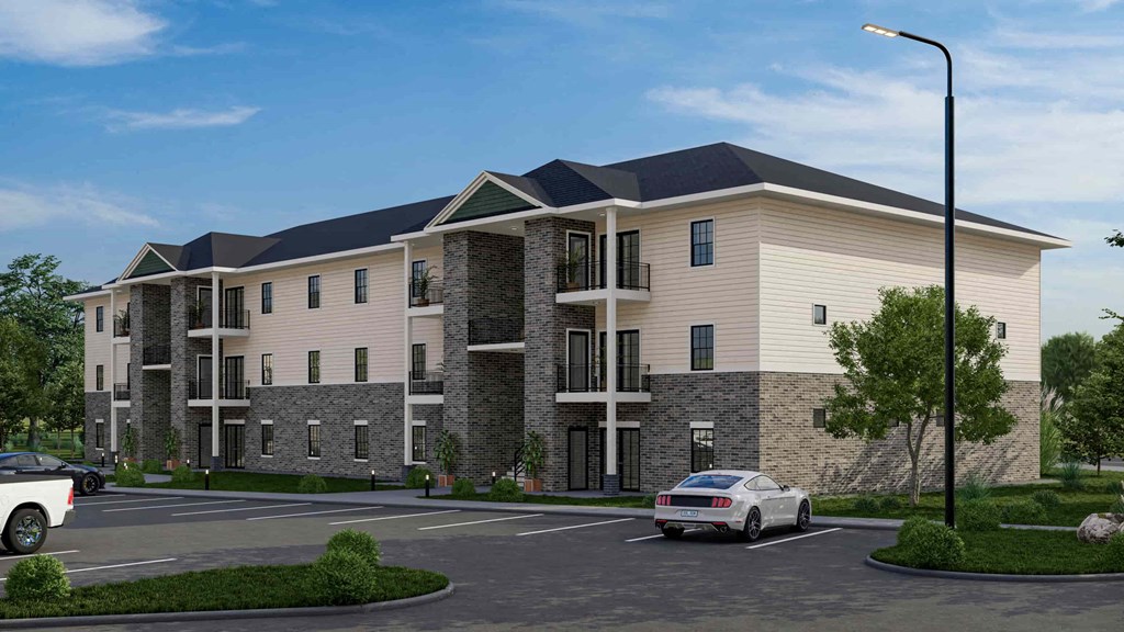 a rendering of an apartment building with cars parked in a parking lot