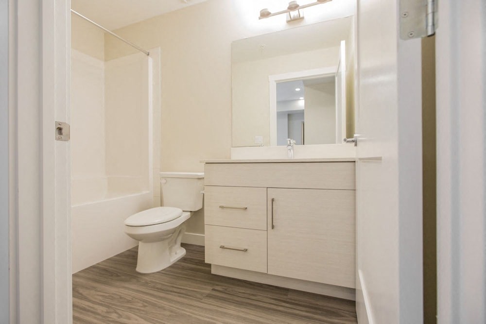 a bathroom with a toilet and a sink