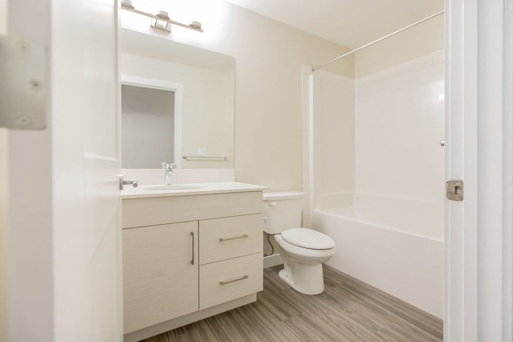 a bathroom with a toilet and a sink