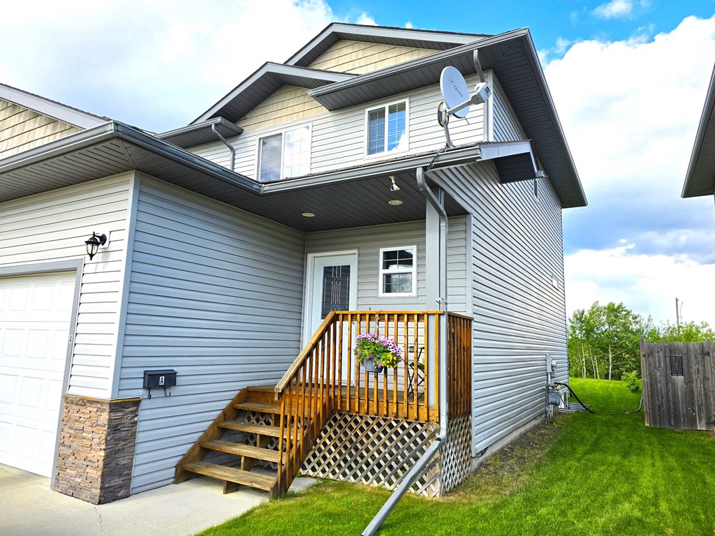 a house with a satellite dish on the side of it