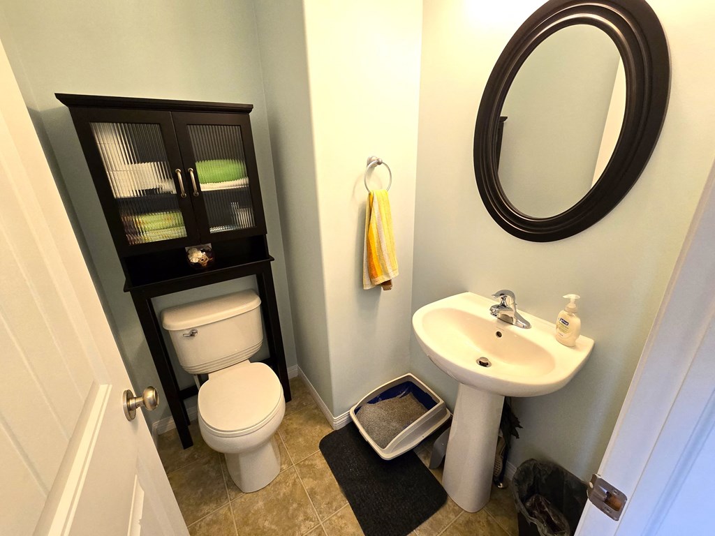 a small bathroom with a toilet and a sink