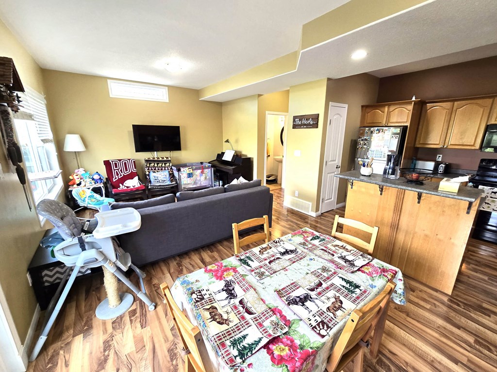 view of the living room and kitchen from the balcony