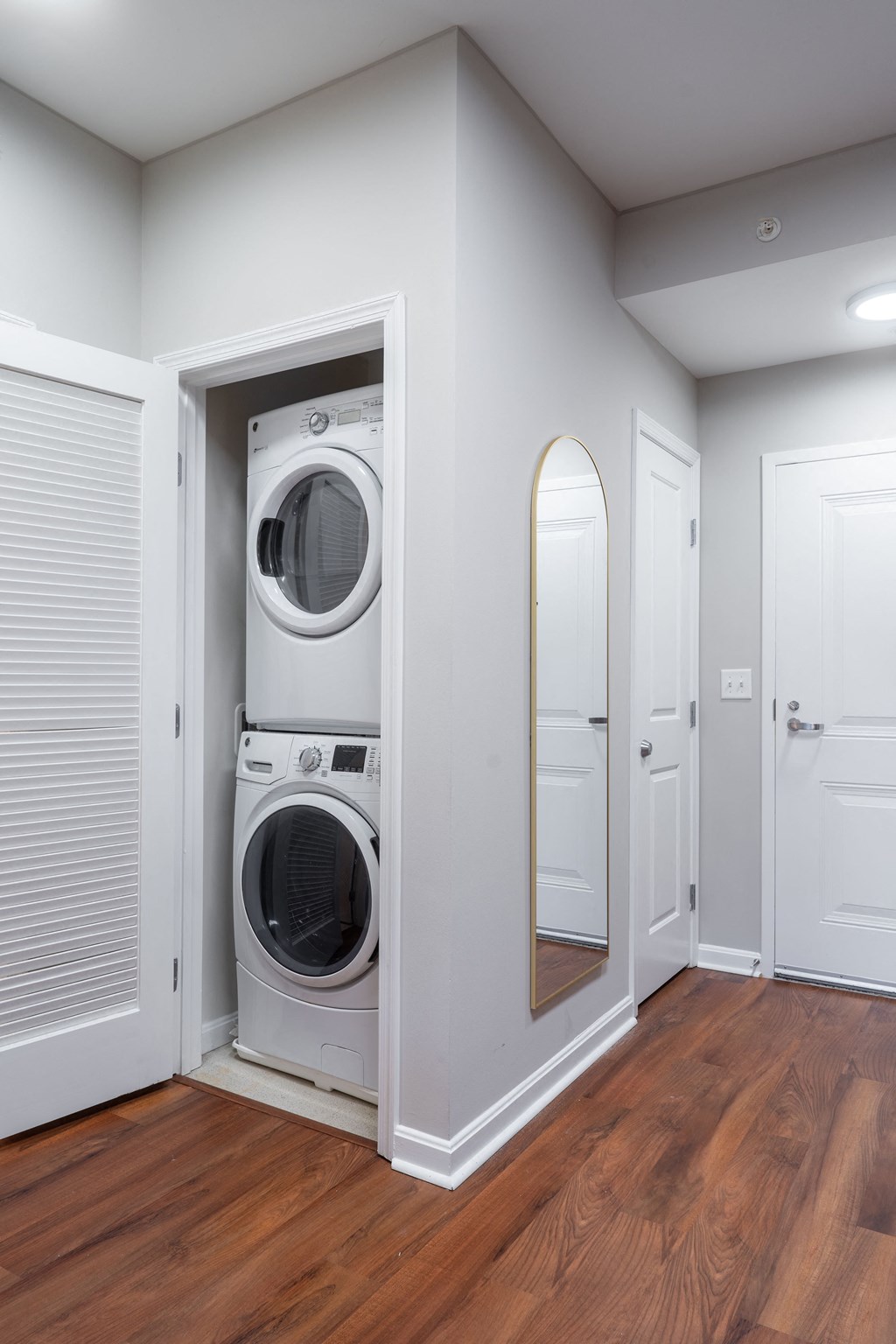 a small laundry room with a washer and dryer in a closet