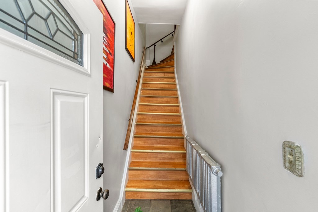 the stairway up to the second floor of a house