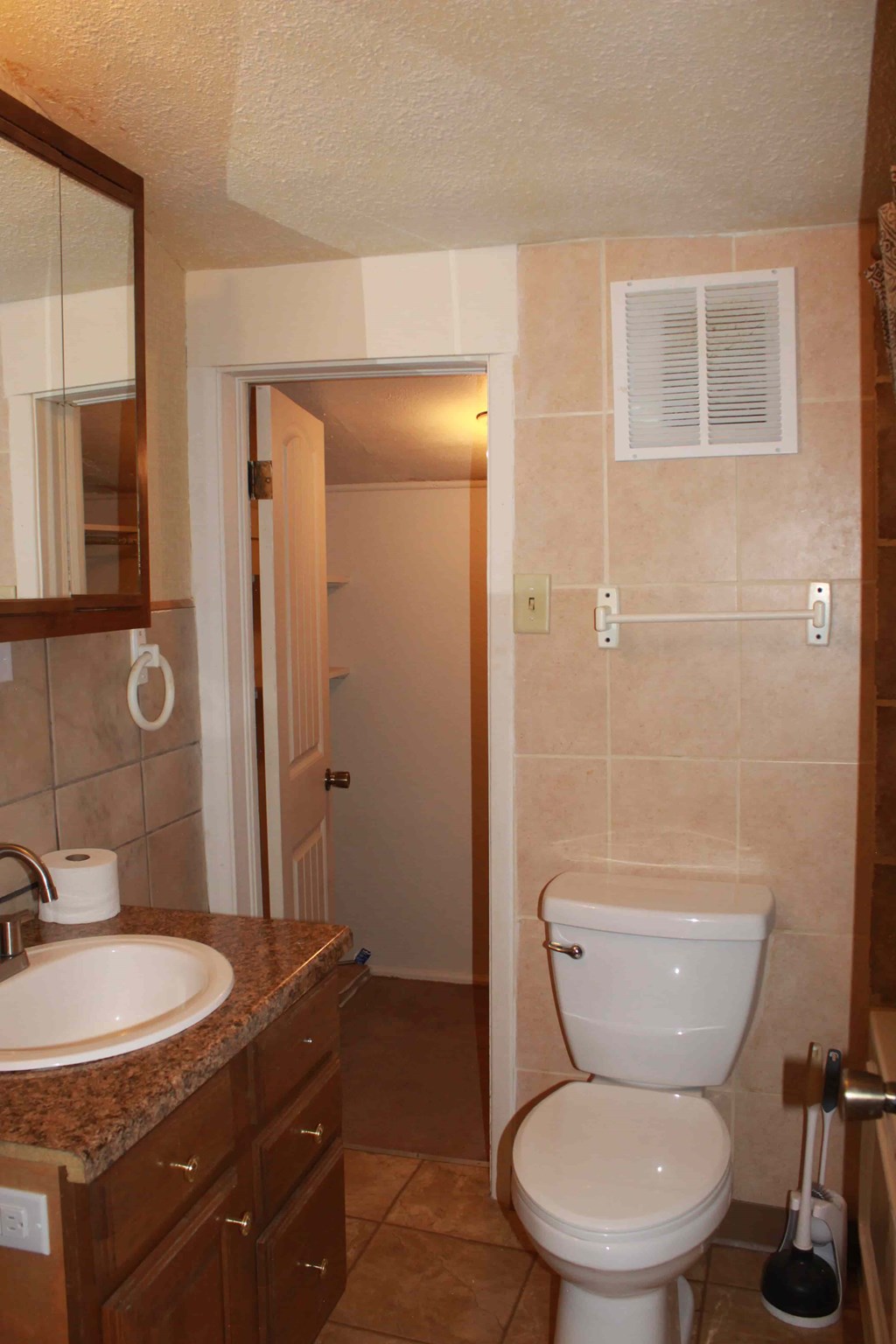 a small bathroom with a toilet and a sink