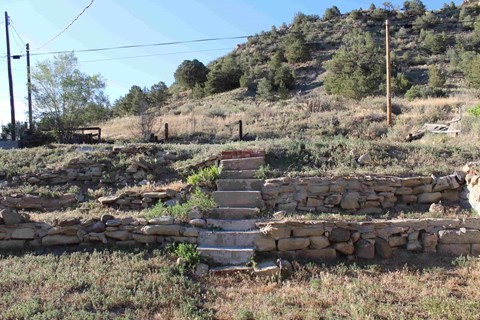 a set of stone steps leading up a hill