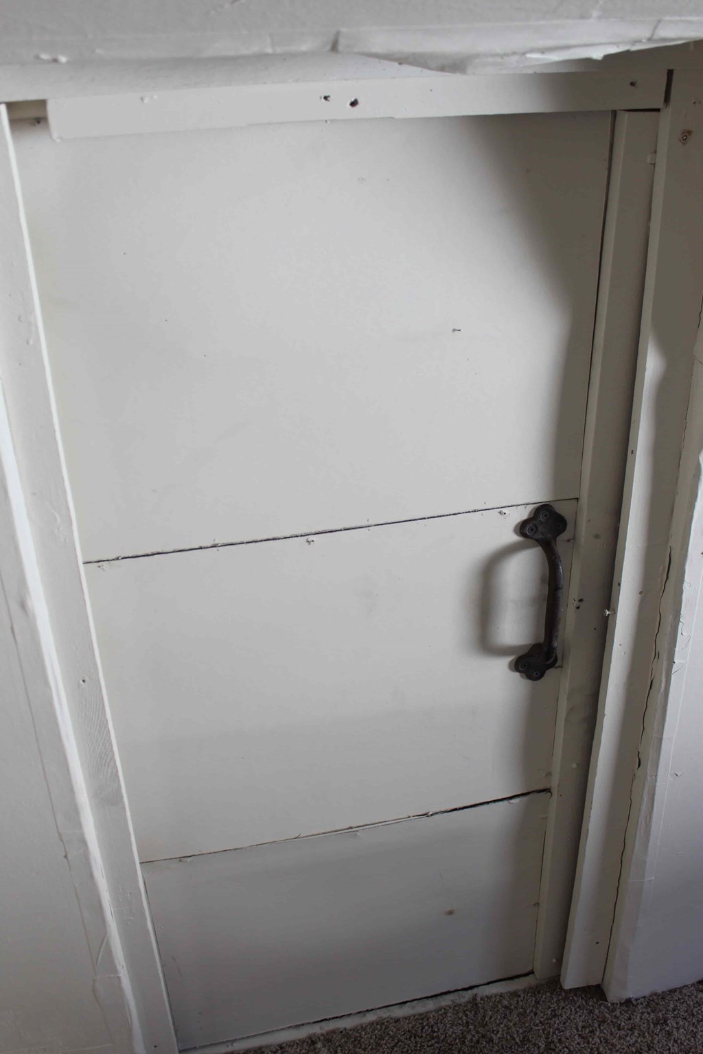 a white door with a handle on it