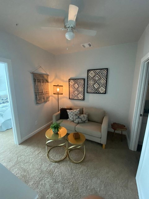 a living room with a couch and a table