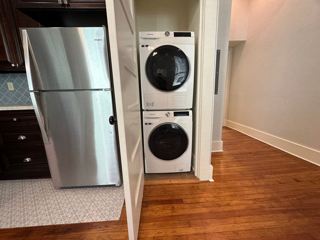 a washing machine and a refrigerator in a doorway