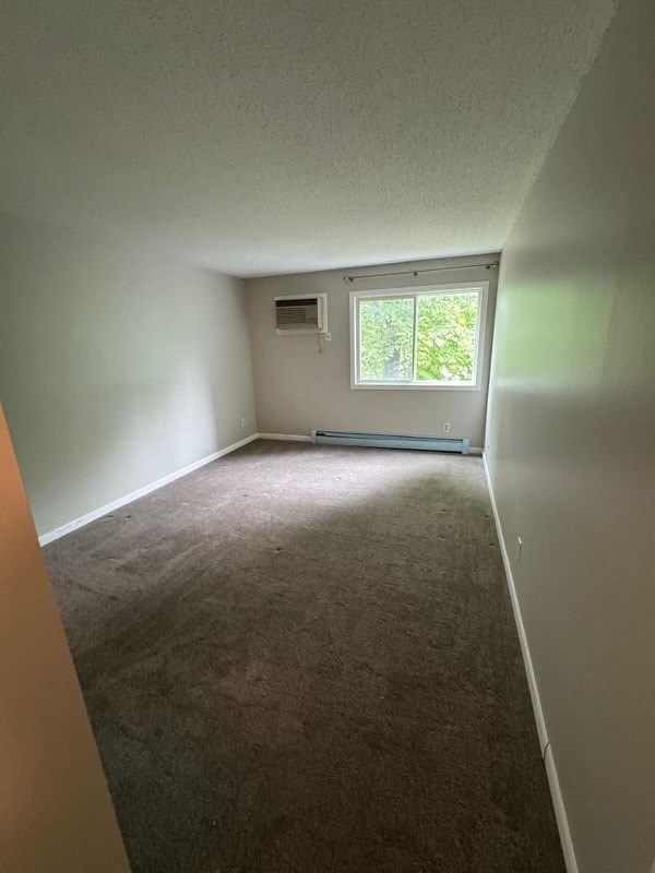 an empty room with a window in it