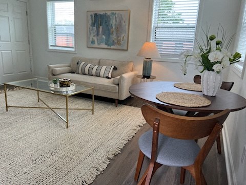 a living room with a table and a couch
