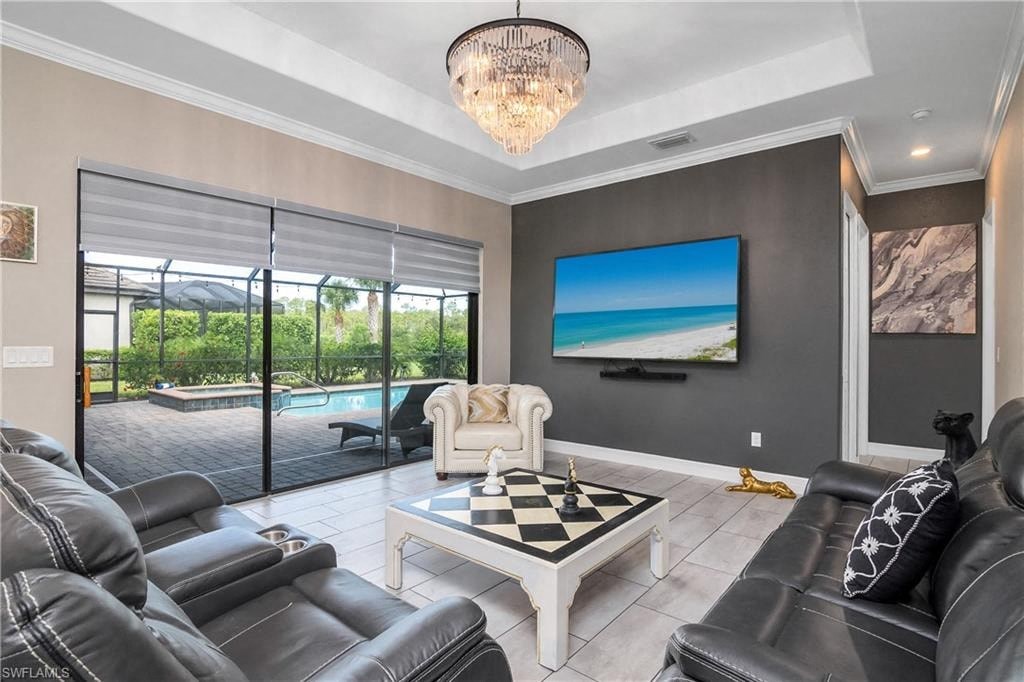 a living room with a couch and a coffee table and a television