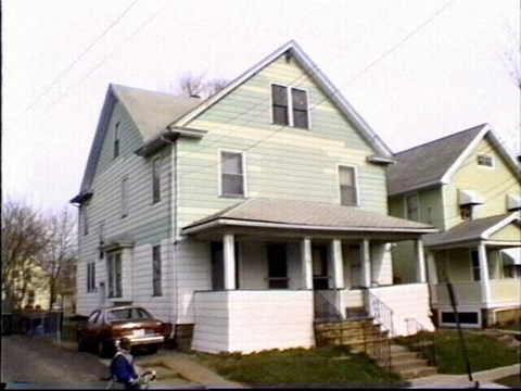a house with a car parked in front of it