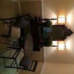 a reflection of a bike in a room with lights