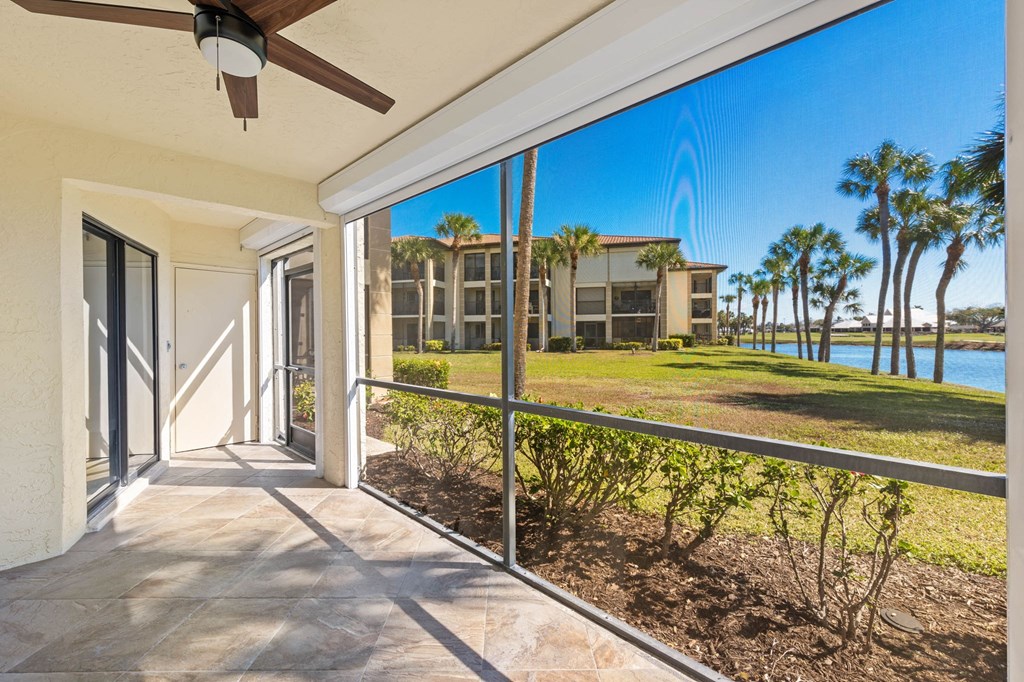 the views of the water from the balcony of a condo