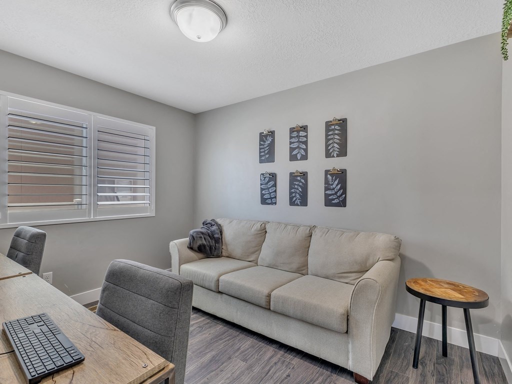 a living room with a couch and a table
