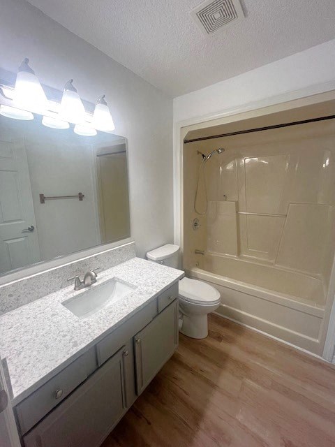 a bathroom with a sink toilet and a shower