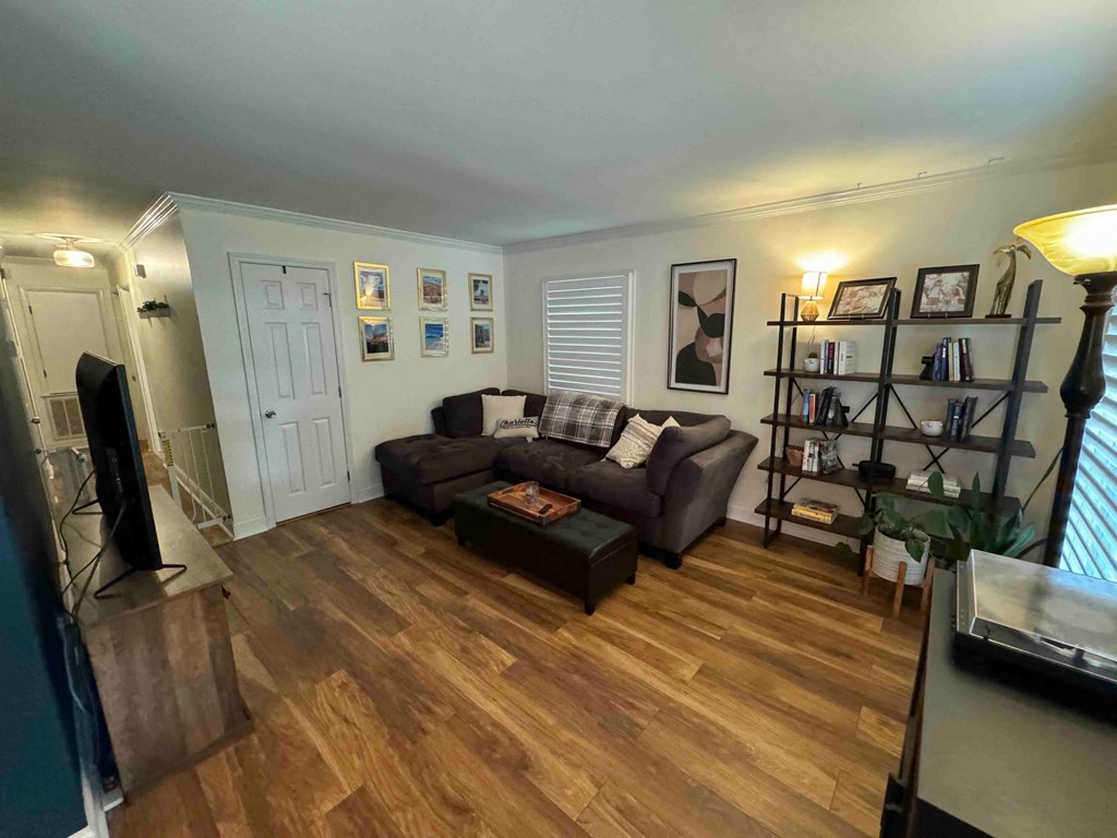 a living room with a couch and a tv