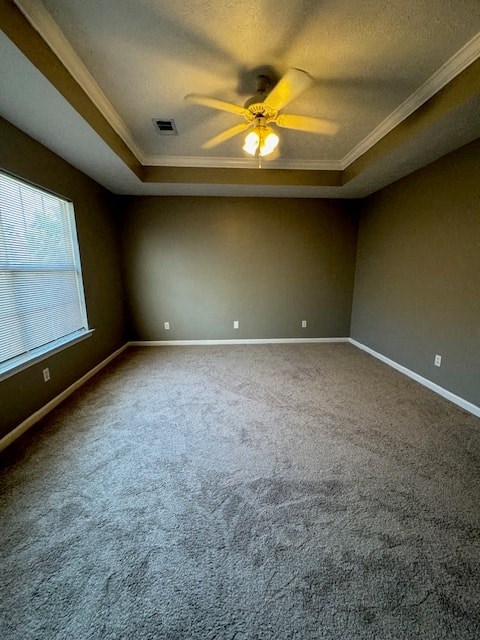 an empty room with a ceiling fan and a window
