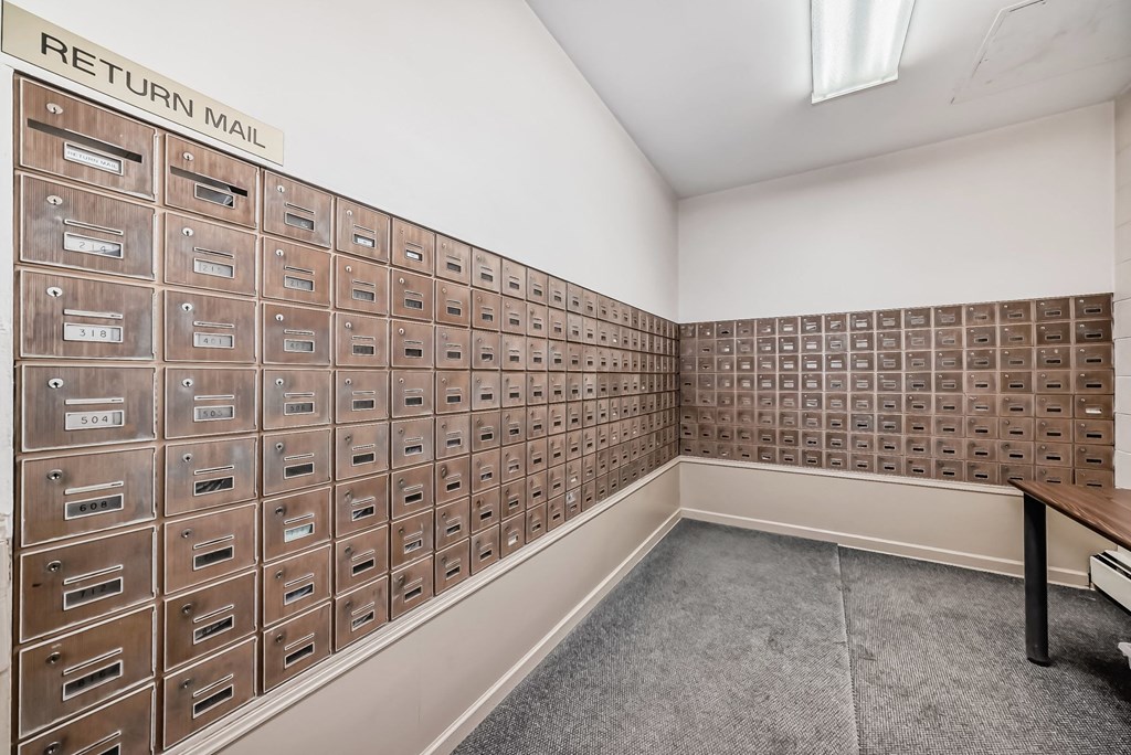 the locker room has a large collection of lockers