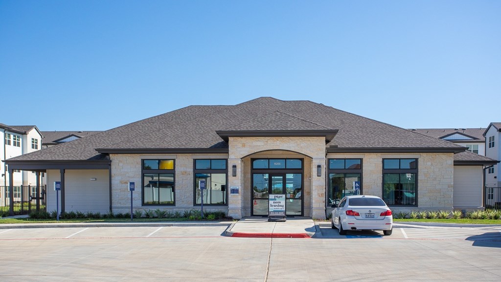 a building with a car parked in front of it