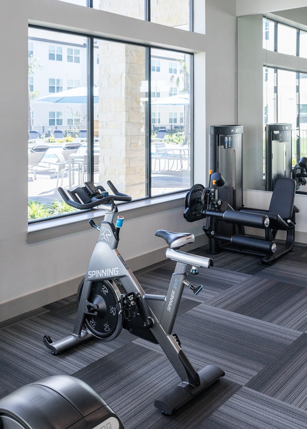 a spin bike in the gym at the renaissance valencia resort and spa