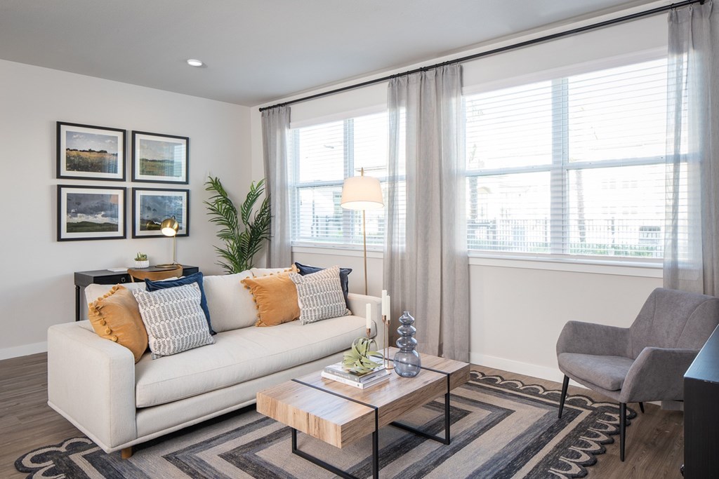 a living room with a couch and a coffee table