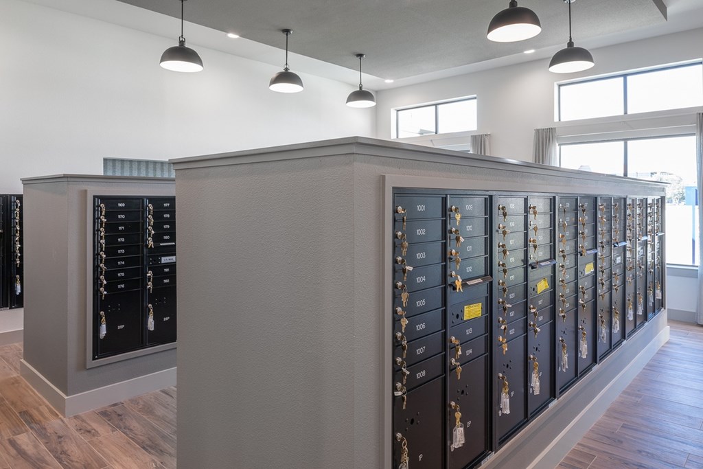 a large array of wine racks in a room with lights