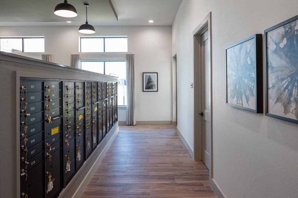 a long hallway with vaulted ceilings and lockers
