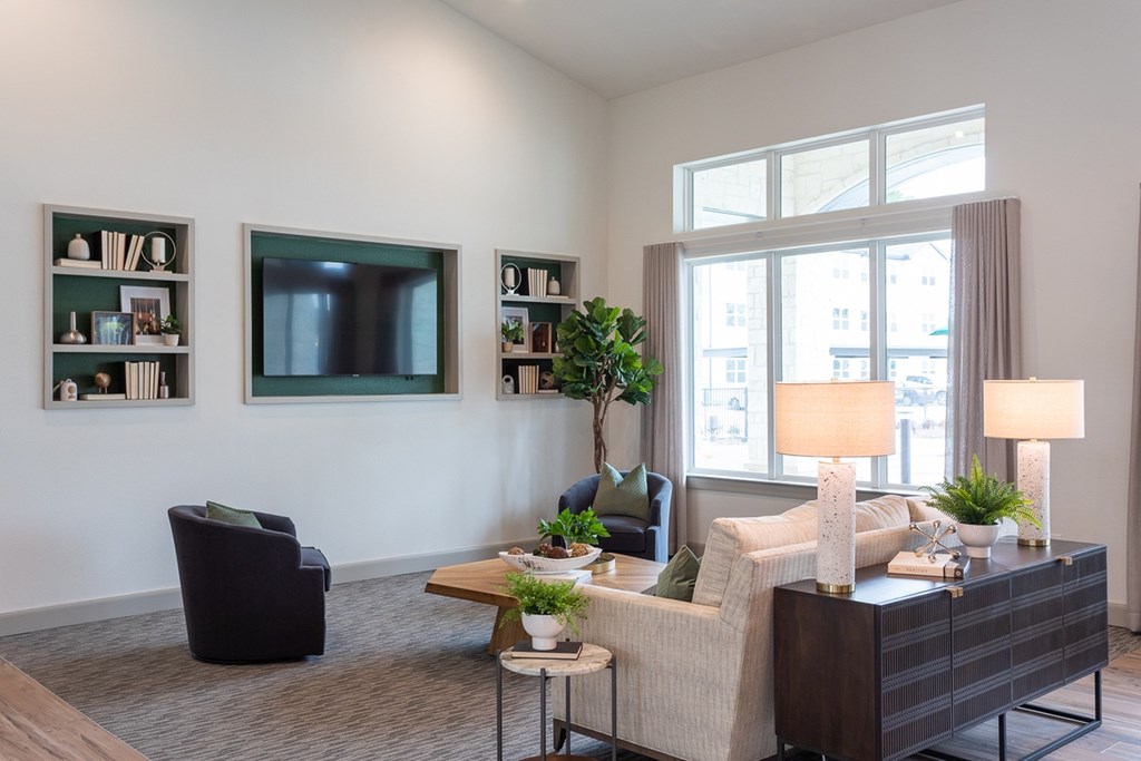 a living room with a couch and a tv