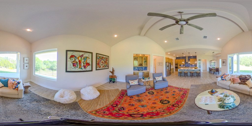 a view of a living room and dining room from above